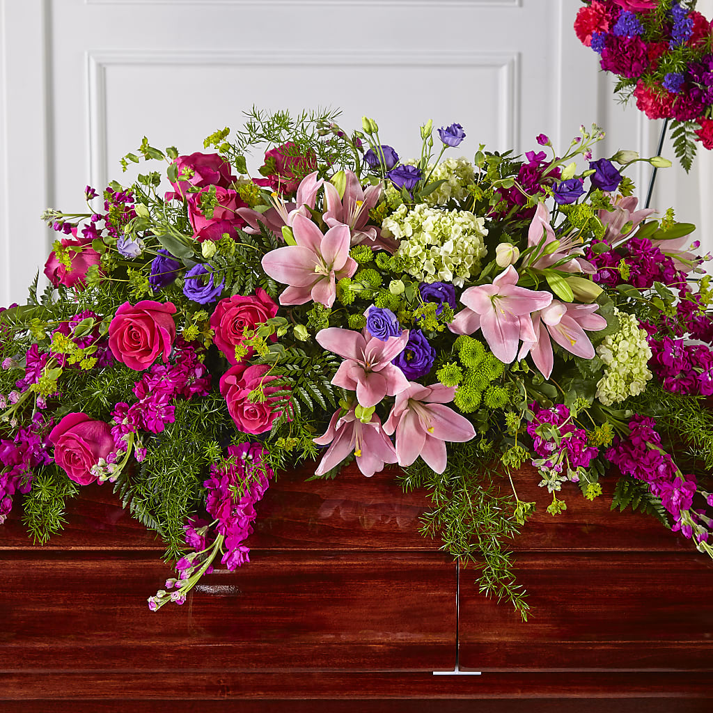 Radiant Tribute Casket Spray – POTTING BENCH FLORIST & GIFTS, Fairhaven MA